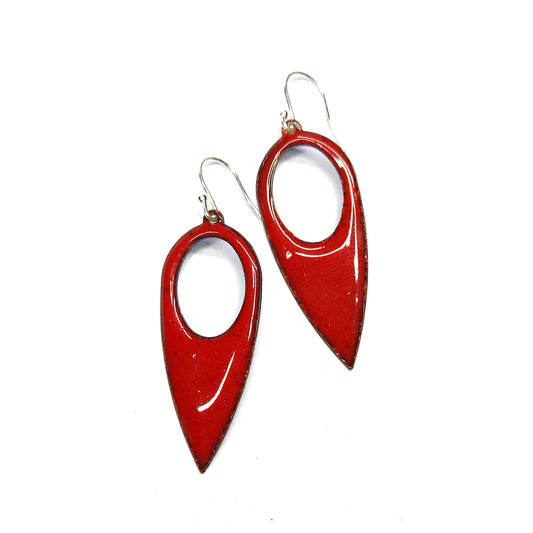 Red enamel drop earrings. These large earrings are teardrop-shaped with a cut out hole.