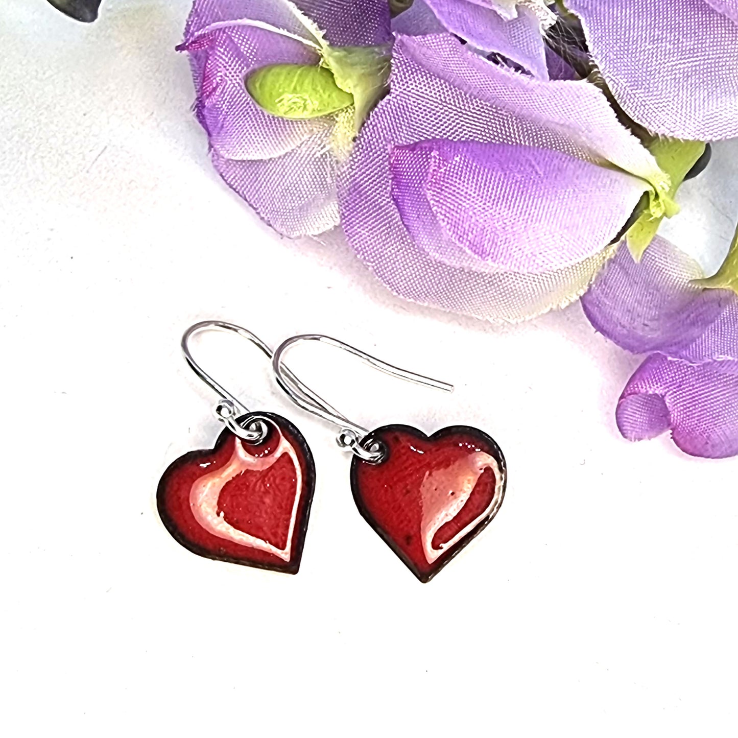 Red enamel heart drop earrings with flowers
