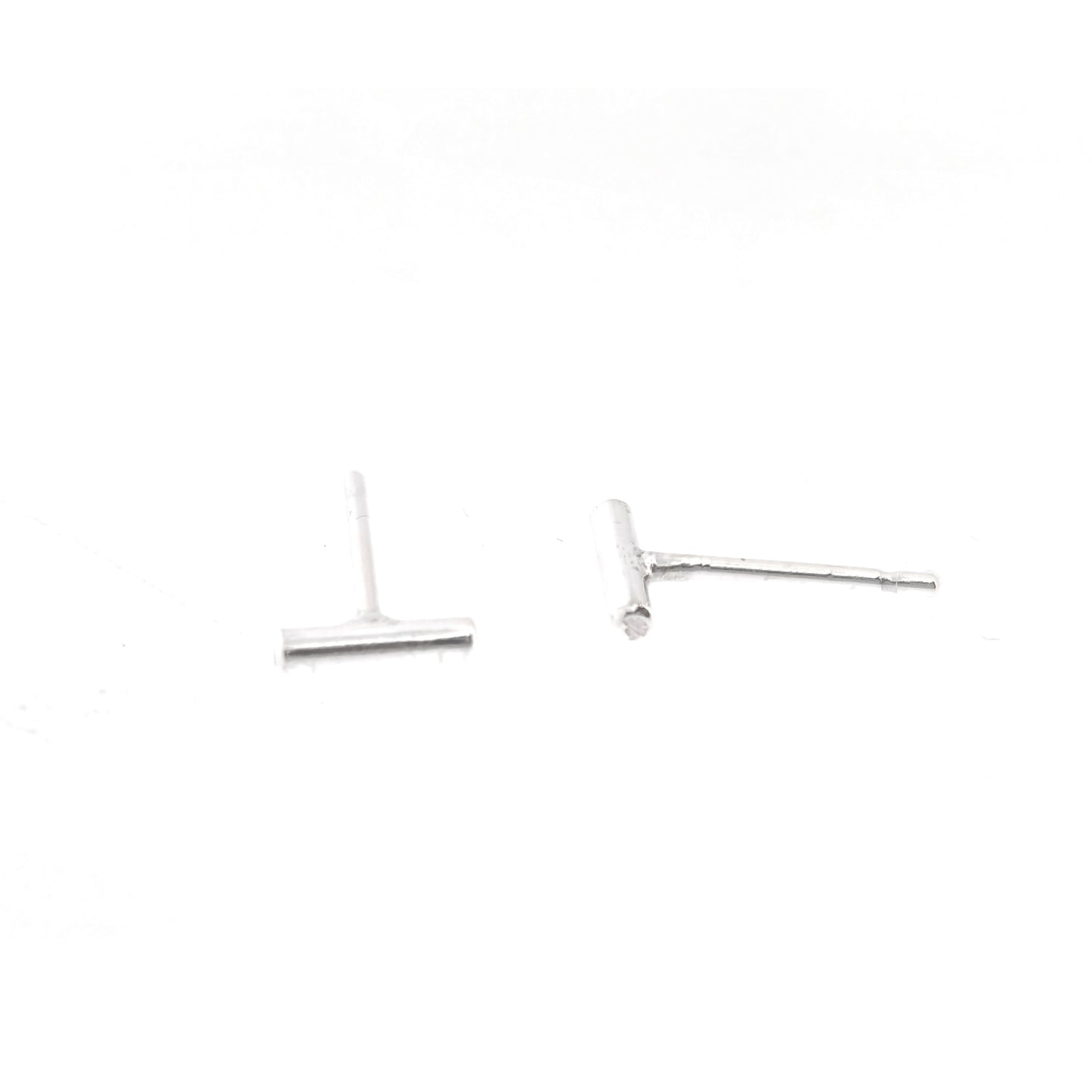 Silver bar stud earrings, front and side view.