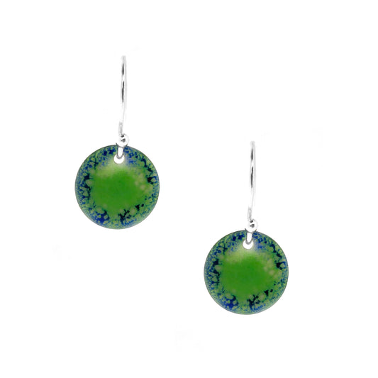 Silver earrings featuring a disc coloured with a pattern of green and blue enamel on silver ear hooks.