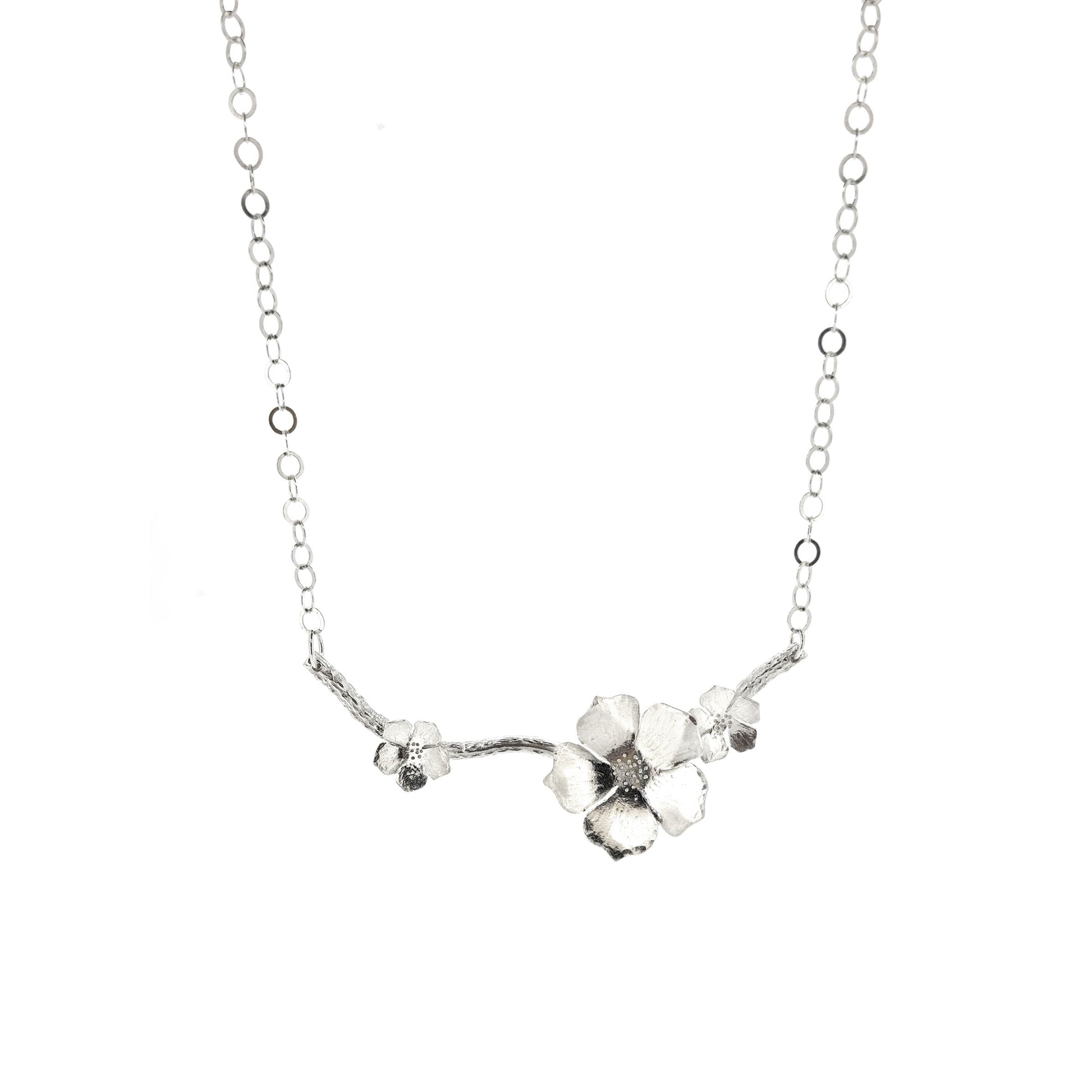 Silver branch necklace with three blossom flowers and open large link chain.