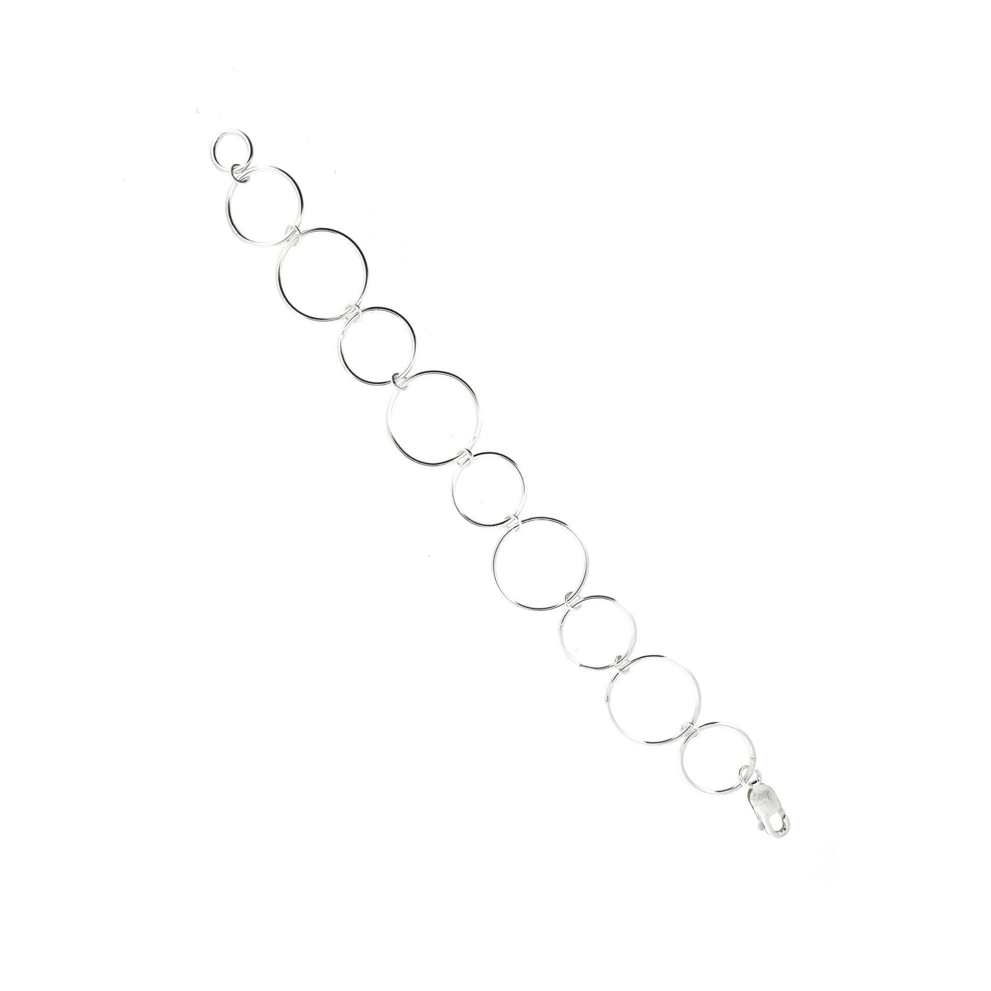 Silver chain link bracelet with circle links of different sizes.