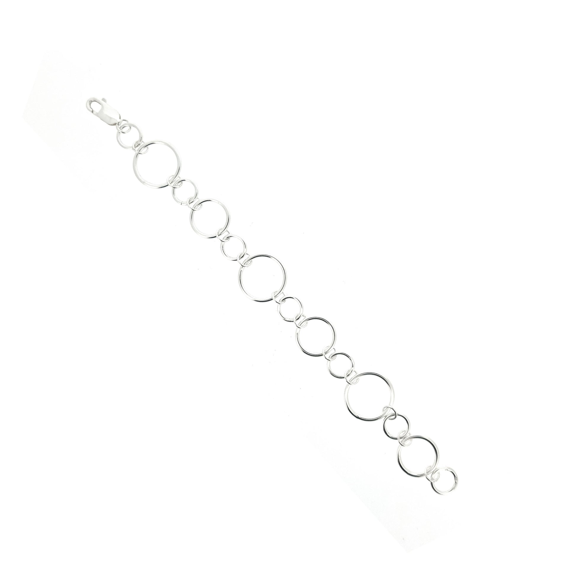 Silver chain link bracelet with circle links of different sizes.