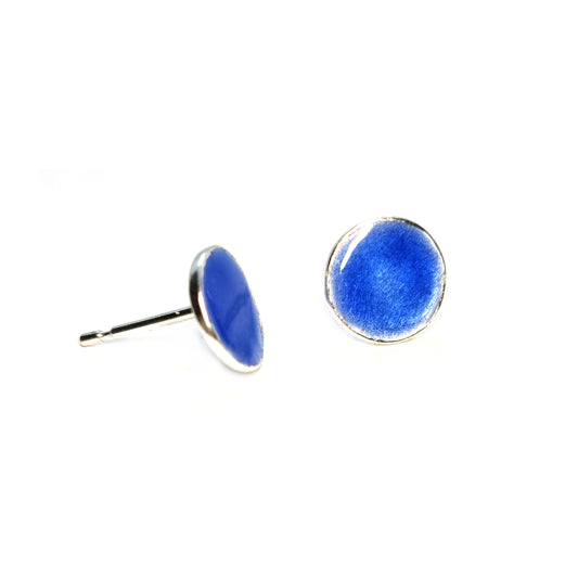 Round silver stud earrings with royal blue enamel.
