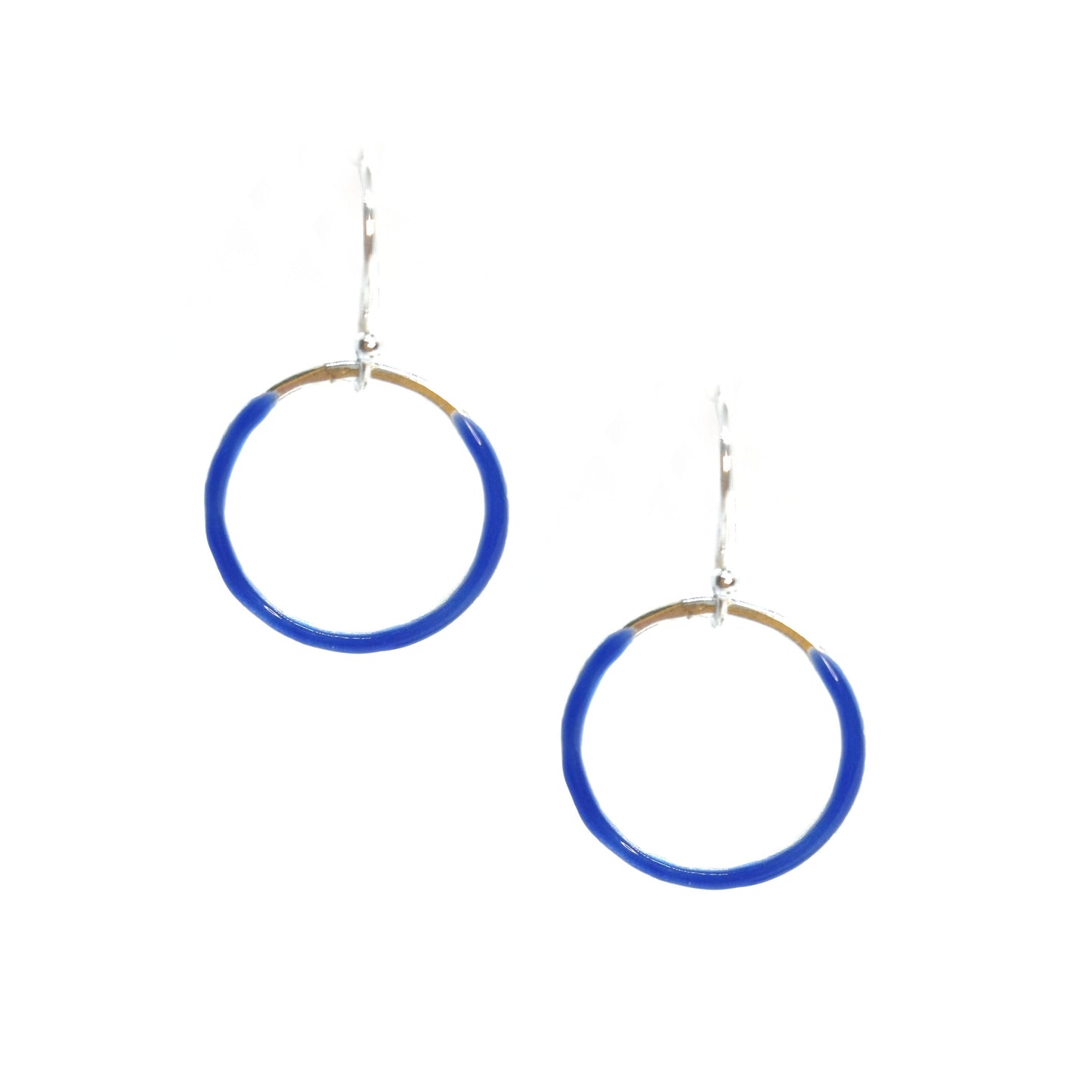Silver open circle drop earrings with royal blue enamel.