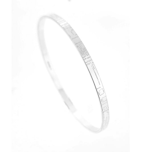 A flat sterling silver bangle with a square and line pattern. Mijoux Jewellery.