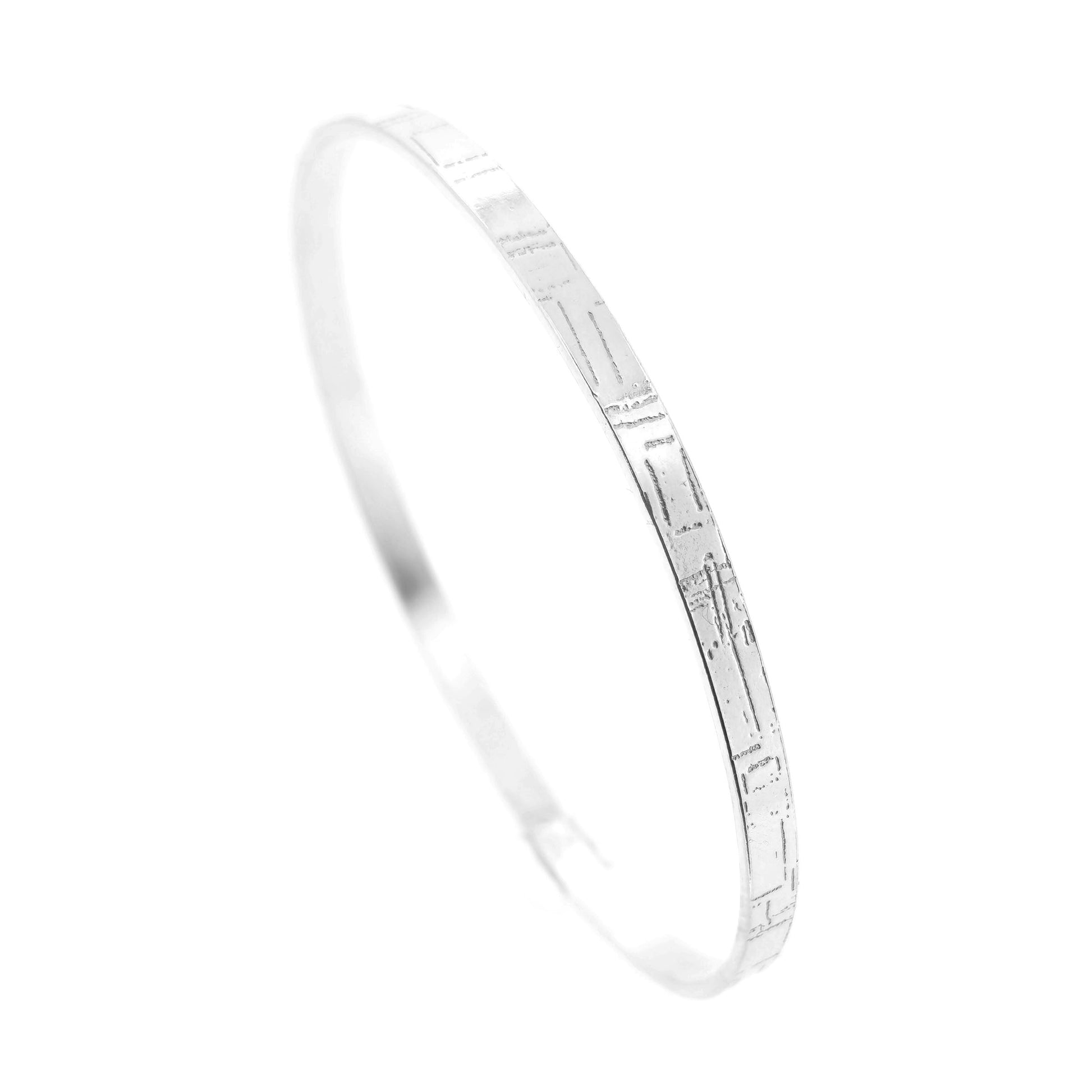 A flat sterling silver bangle with a square and line pattern. Mijoux Jewellery.