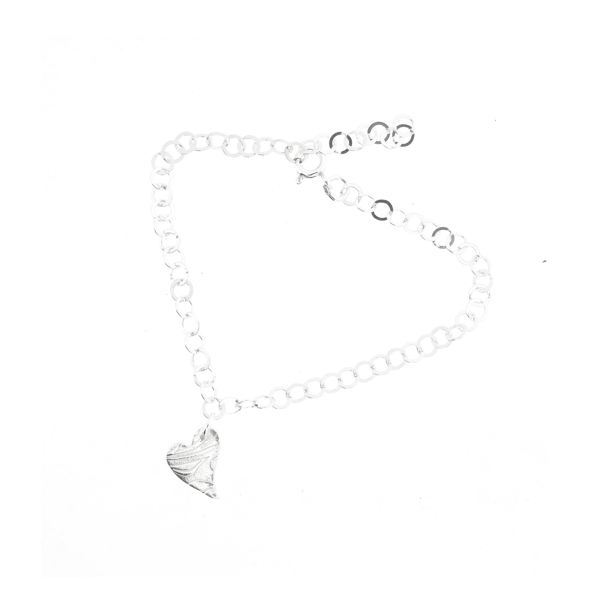 Silver large link chain bracelet with asymmetrical patterned heart charm.