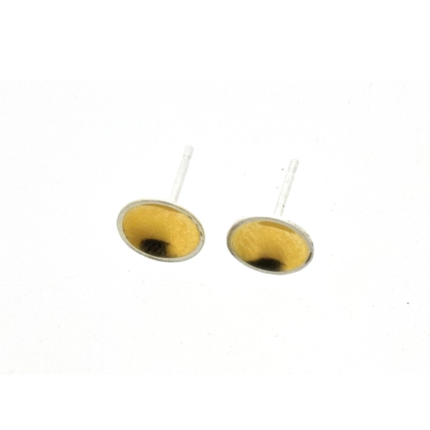 Silver round stud earrings with a gold center. Small.