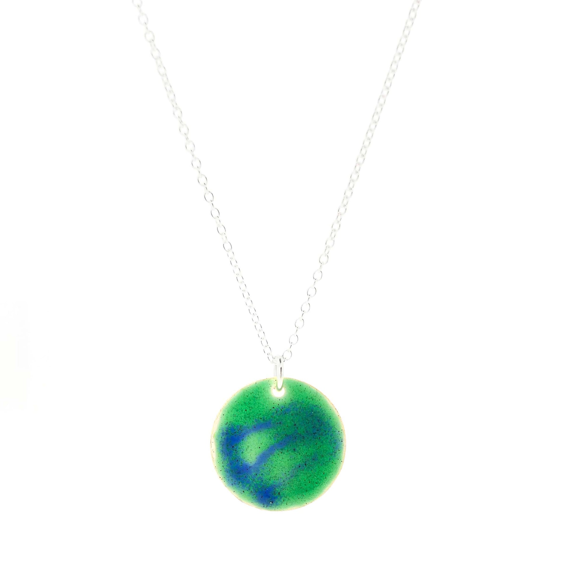 Necklace with a green and blue enamel pendant on a white background
