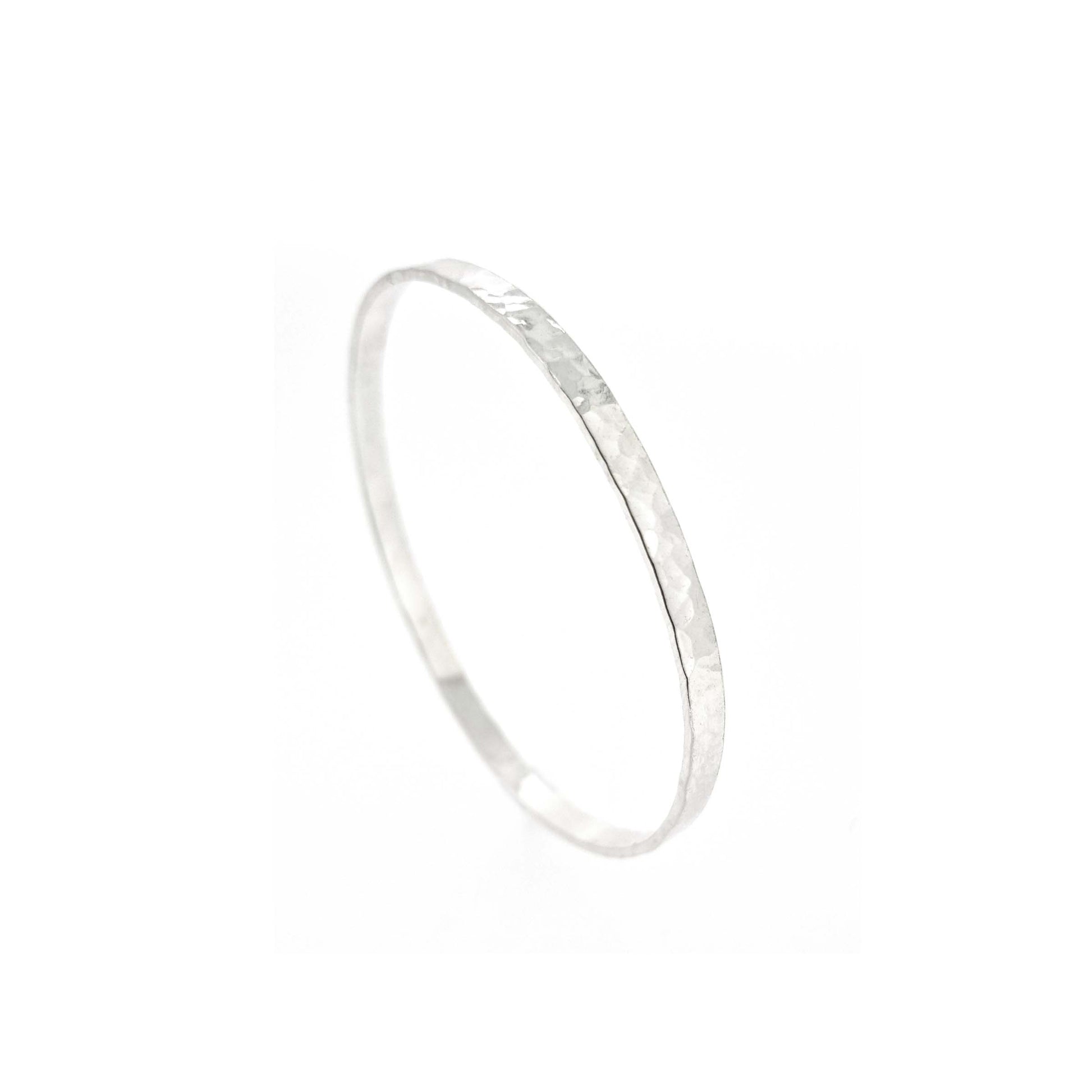 Silver round 4mm wide flat hammered bangle