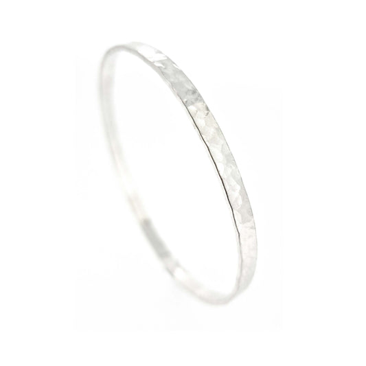 Silver round 4mm wide flat hammered bangle