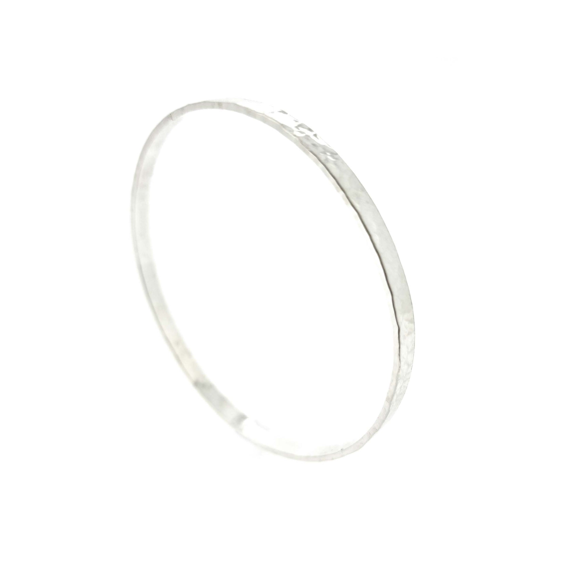 Silver round 4mm wide flat hammered bangle