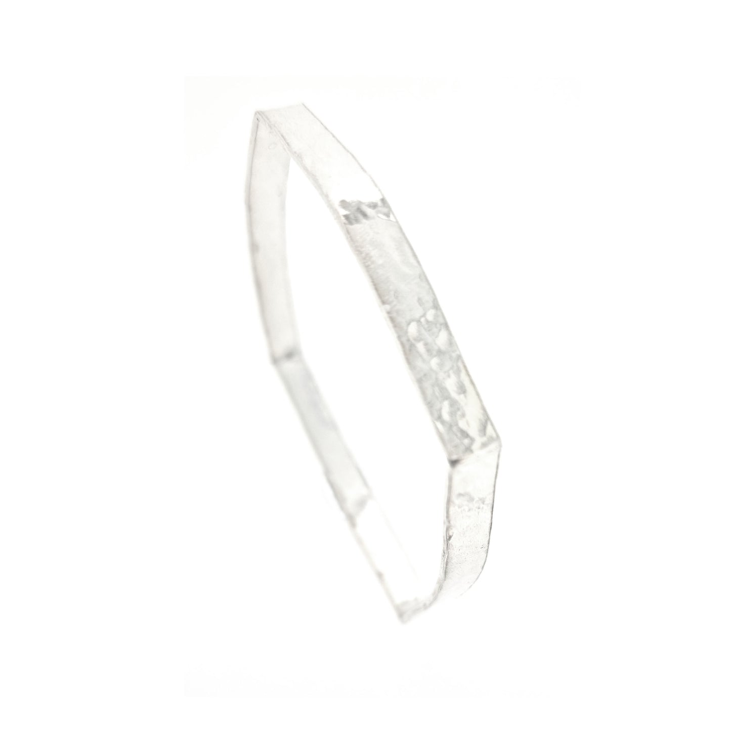 Silver hammered bangle with a round and square profile.