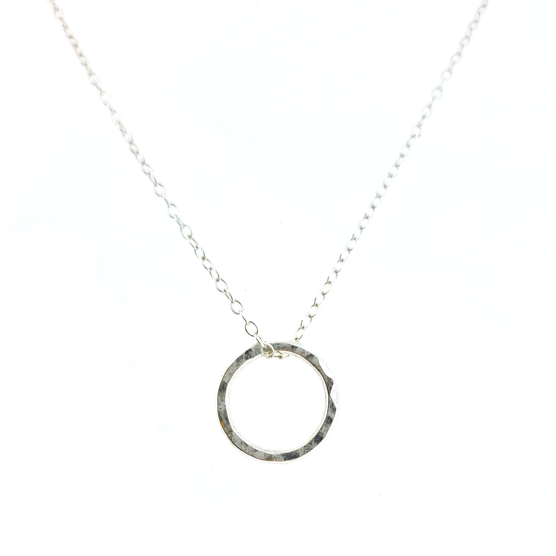 Silver hammered open circle pendant on silver chain - small