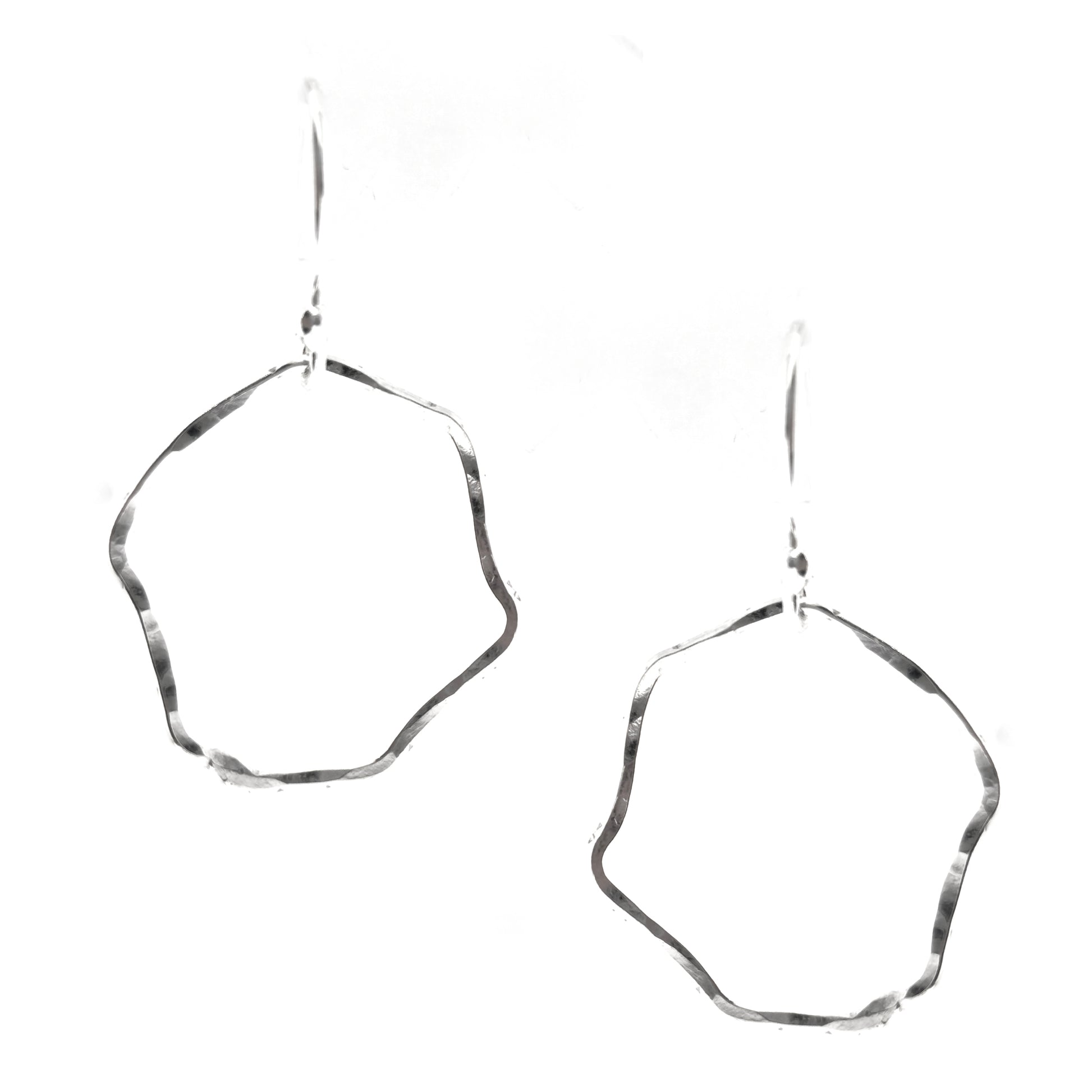 Silver drop earrings with an open organic rustic style circle suspended from silver ear wires - large.