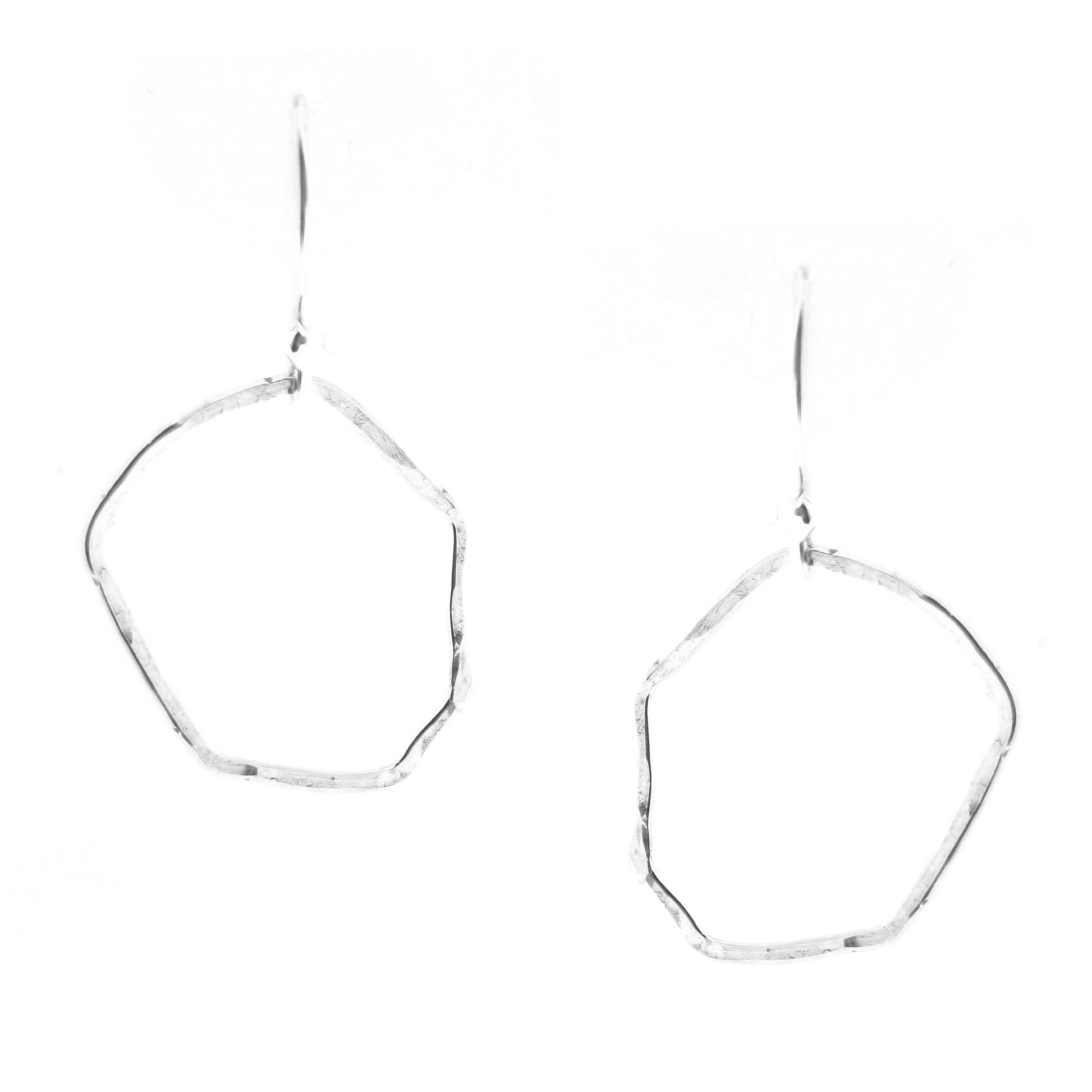 Silver drop earrings with an open organic rustic style circle suspended from silver ear wires - large.