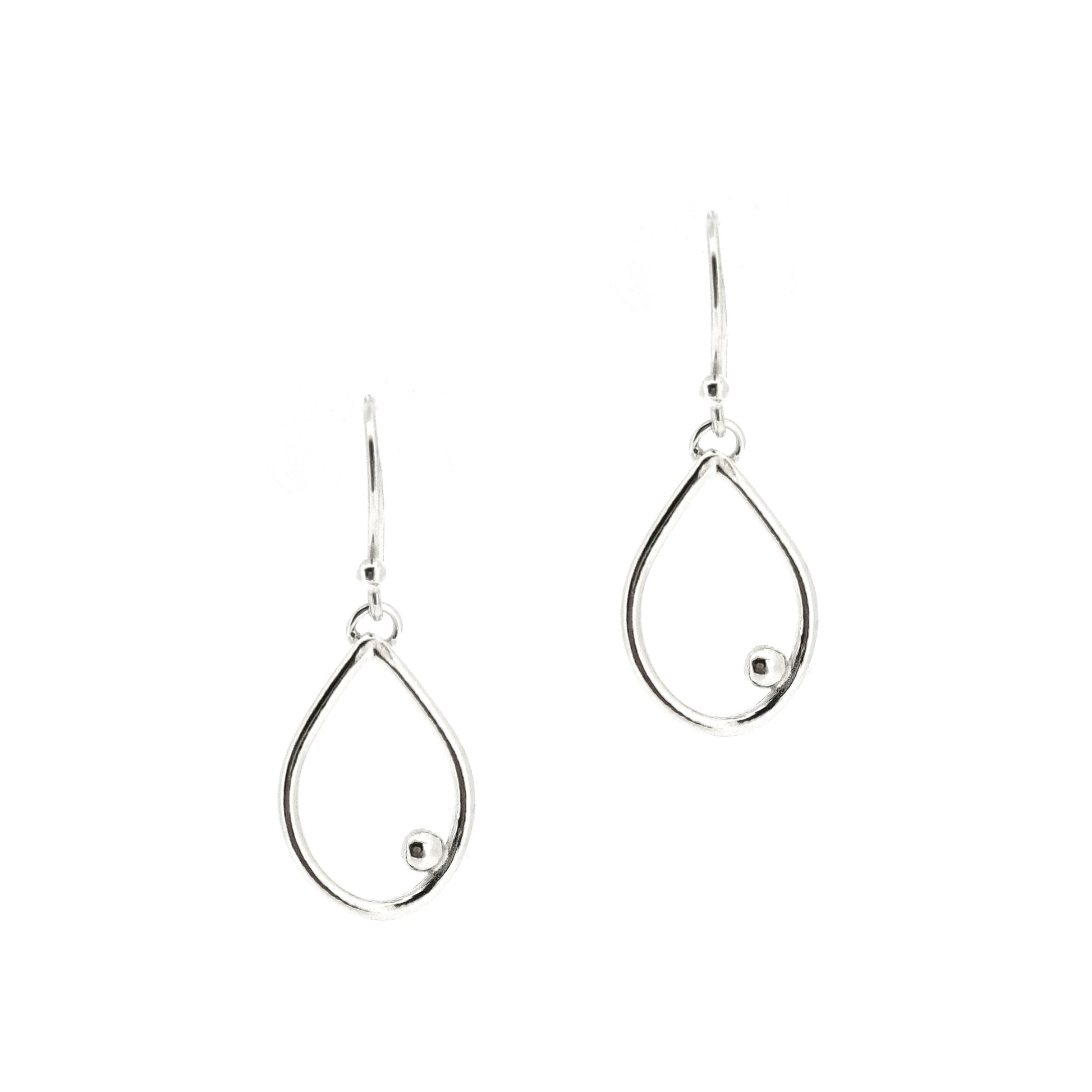 Silver drop earrings featuring an open teardrop shape with an off-centre ball. Medium.