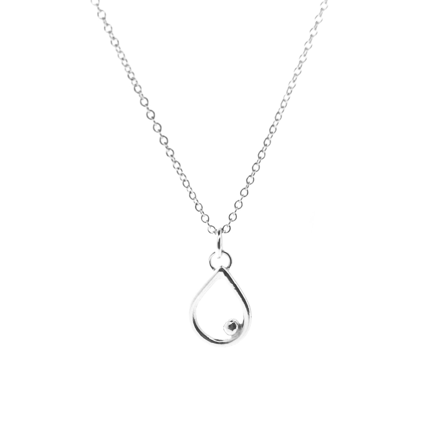 A silver open teardrop shaped pendant with an off-centre ball. On a silver chain. Small.