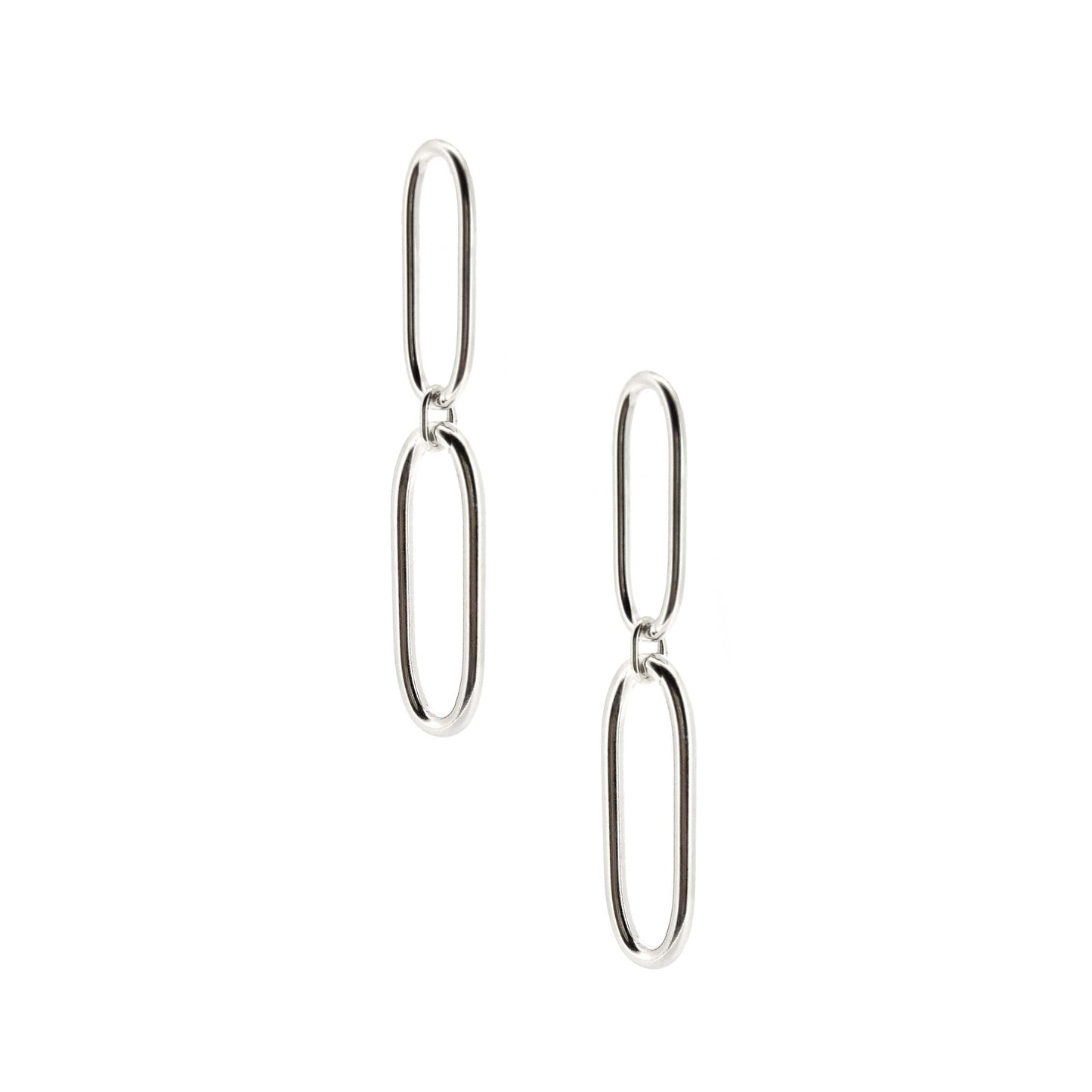 Silver drop earrings featuring 2 open oblong oval shapes attached to each other in a long drop.