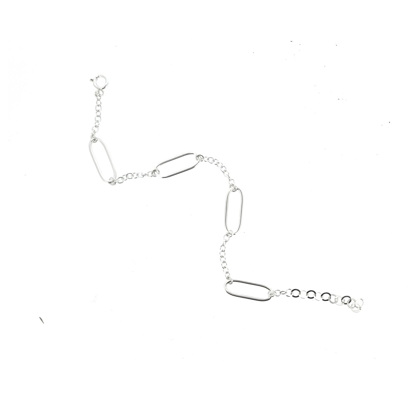 A silver bracelet with 4 oblong oval links set between round linked chain.