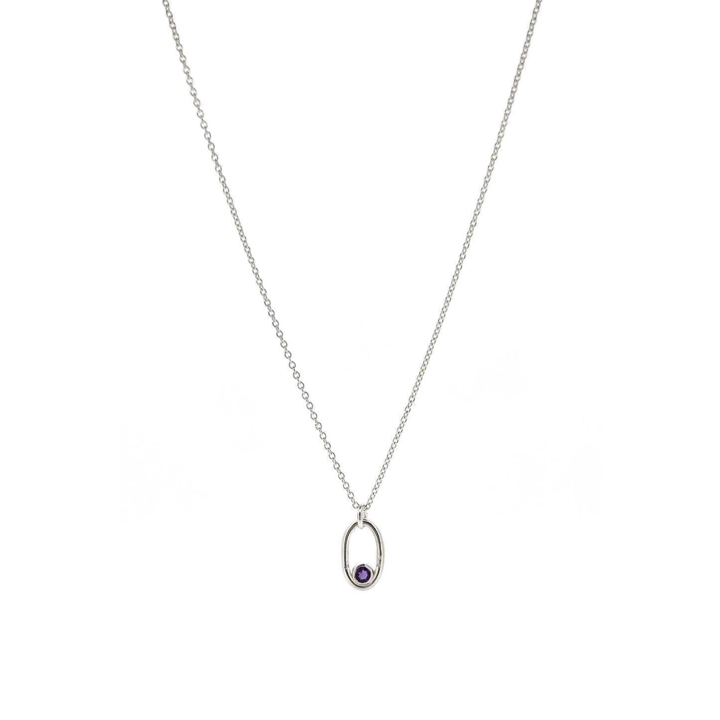 A silver open oblong pendant with a purple amethyst gemstone set in the curve, on a silver chain.