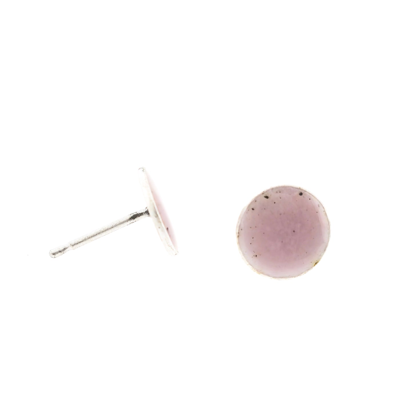 A pair of round silver stud earrings with a pale pink enamel finish.