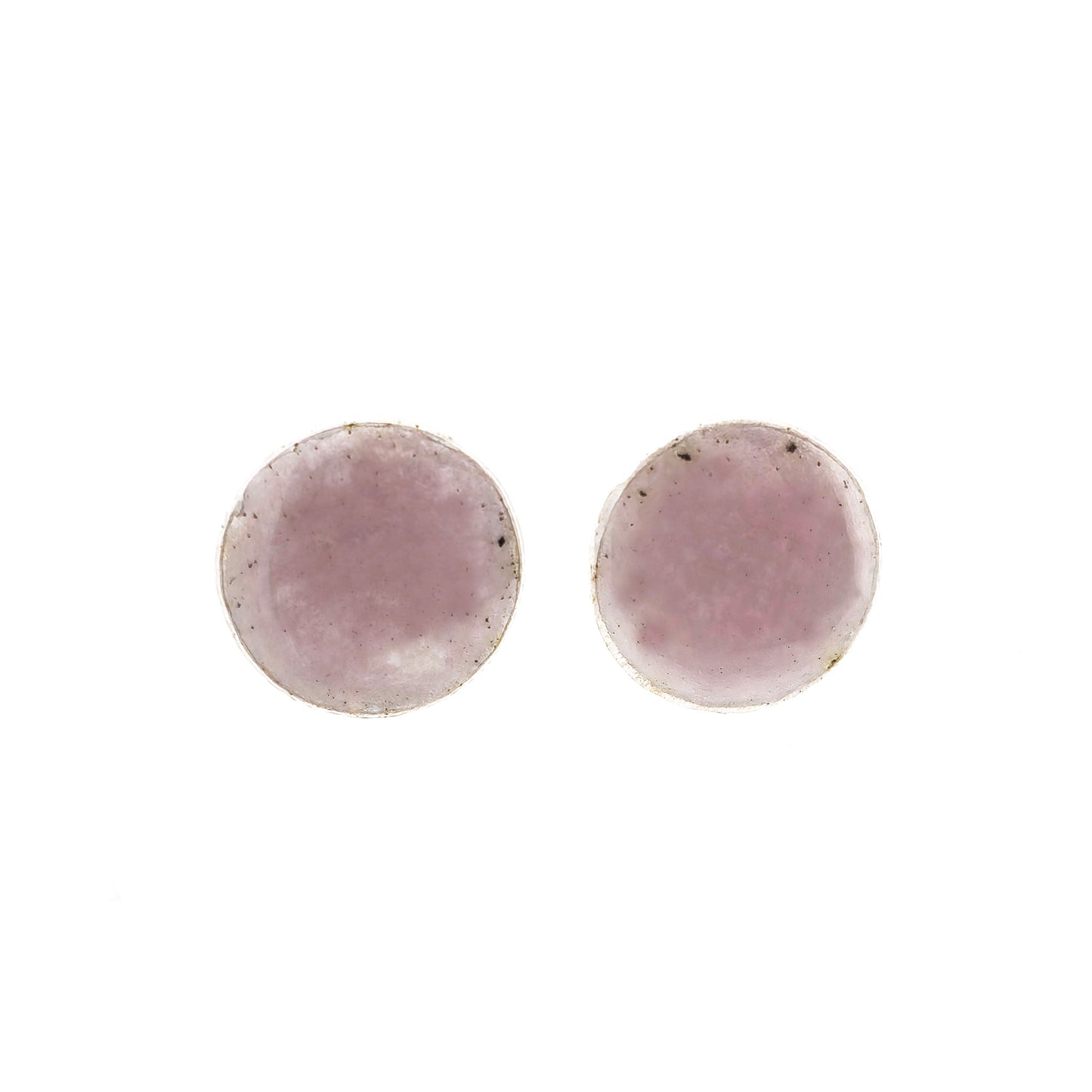 A pair of round silver stud earrings with a pale pink enamel finish.