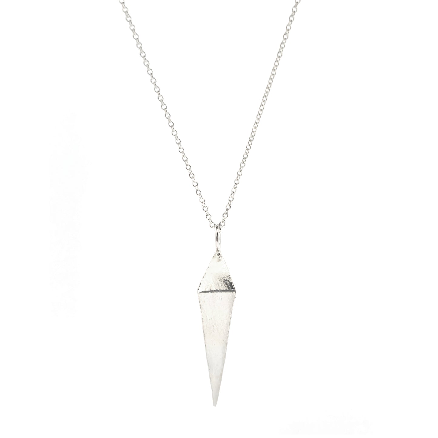 A silver geometric diamond shaped pendant on a silver chain.