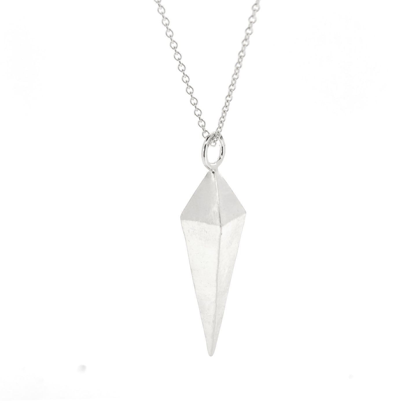 A silver geometric diamond shaped pendant on a silver chain.