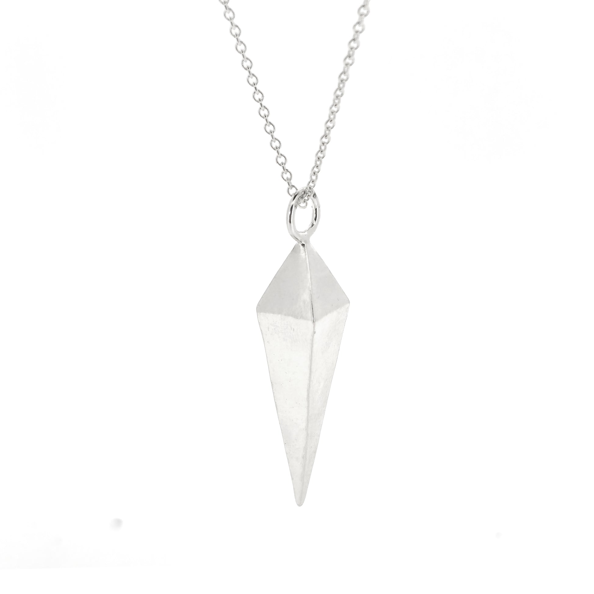 A silver geometric diamond shaped pendant on a silver chain.