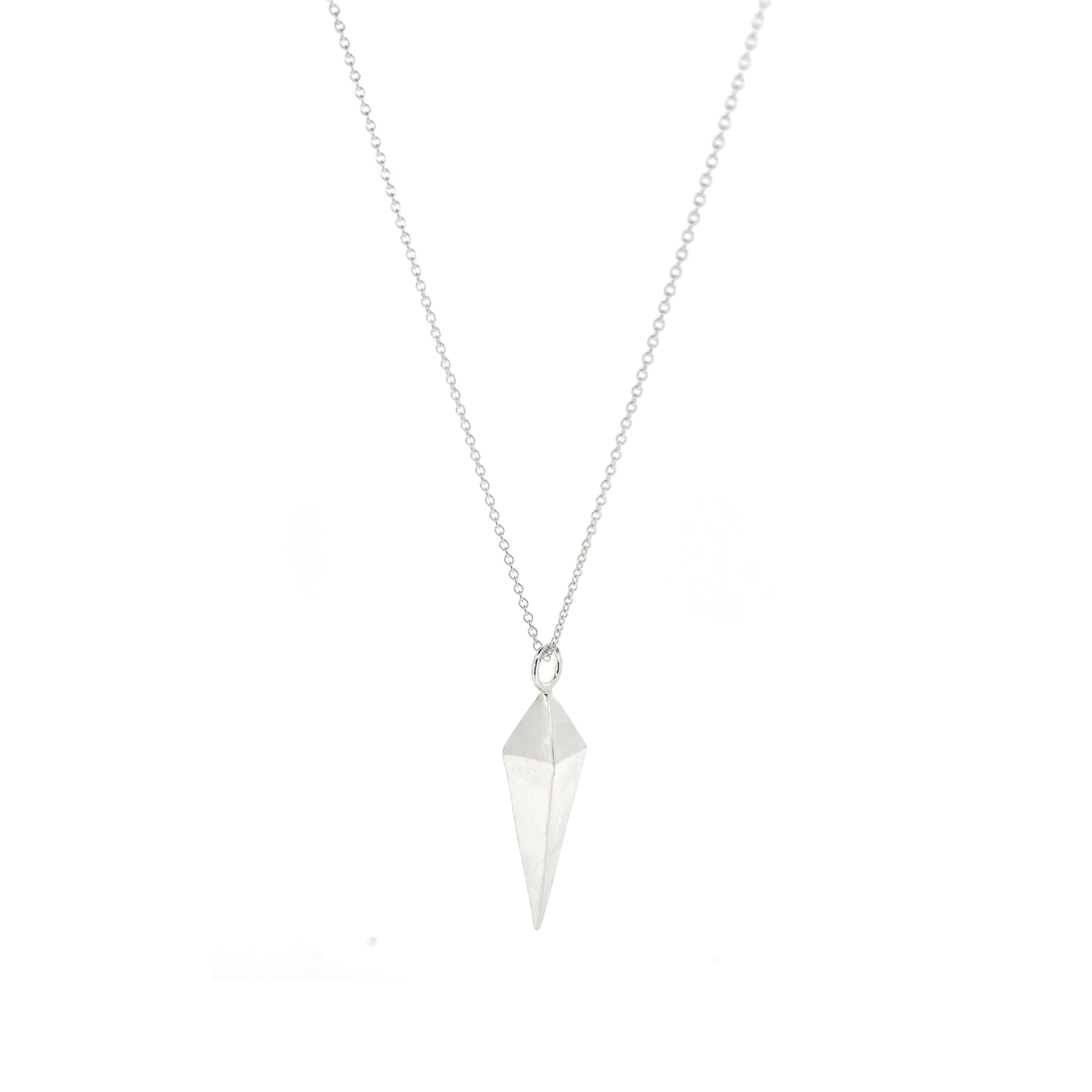 A silver geometric diamond shaped pendant on a silver chain.