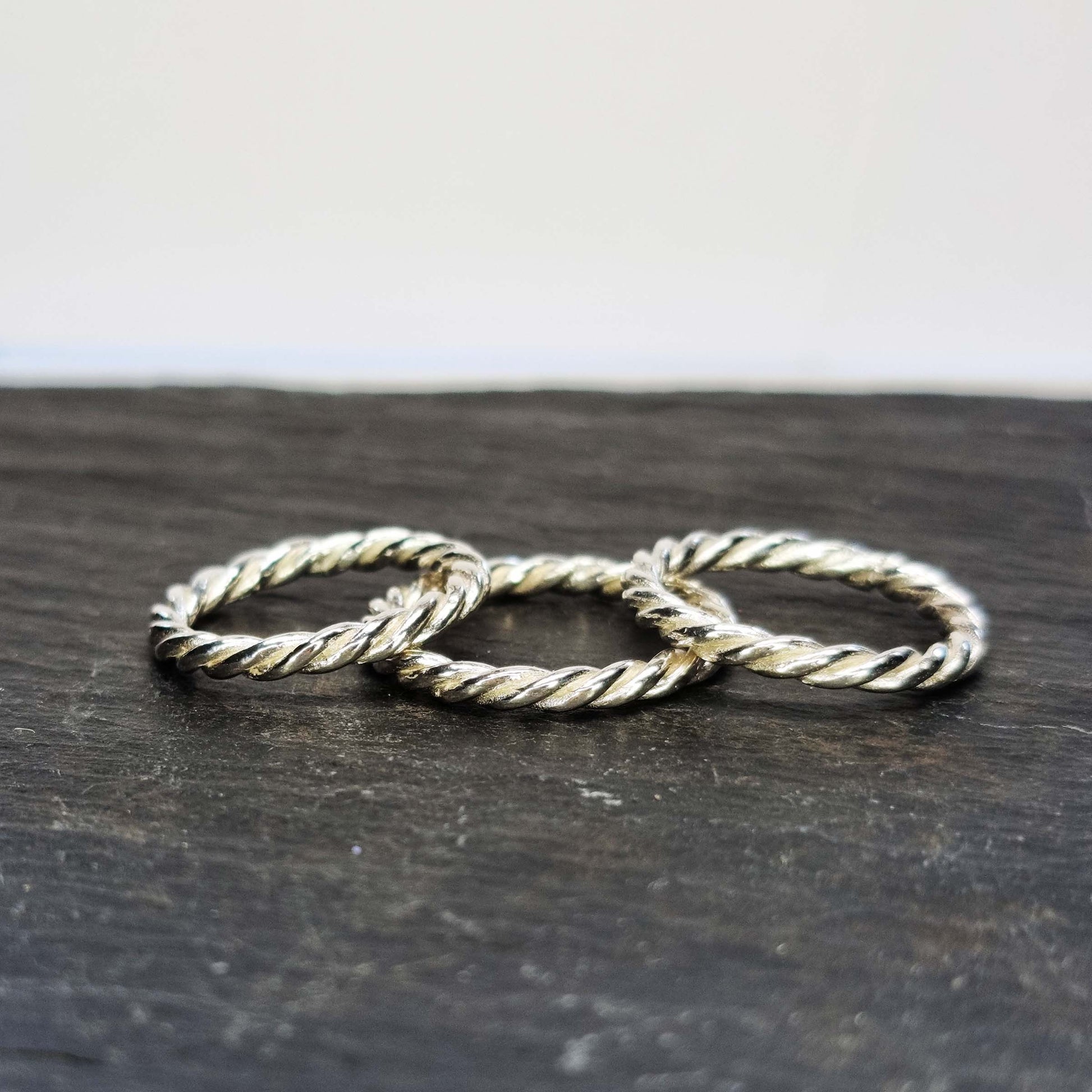Silver twisted rope rings.