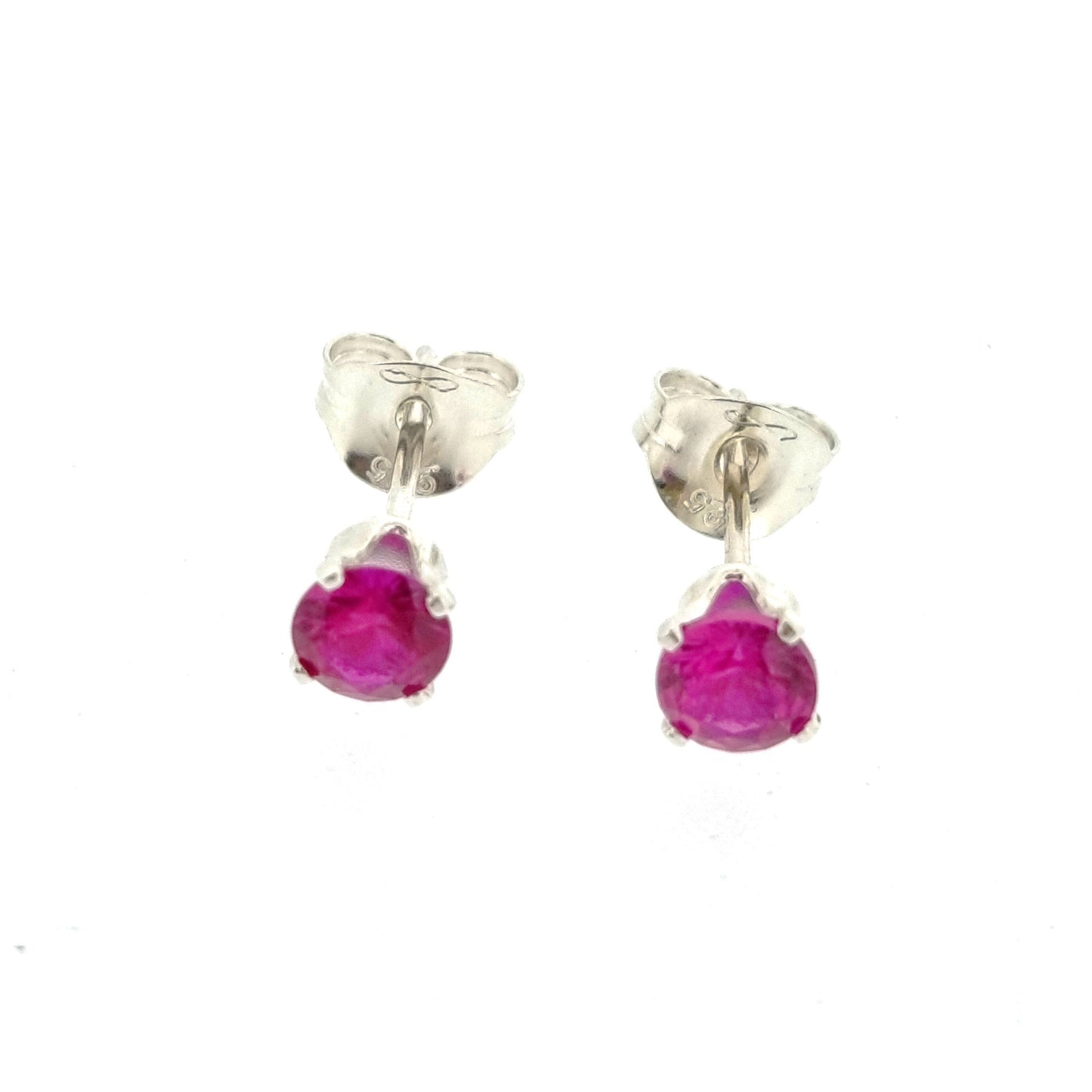 Silver 4 claw stud earrings with a round pinky red ruby gemstone in each. 4mm.