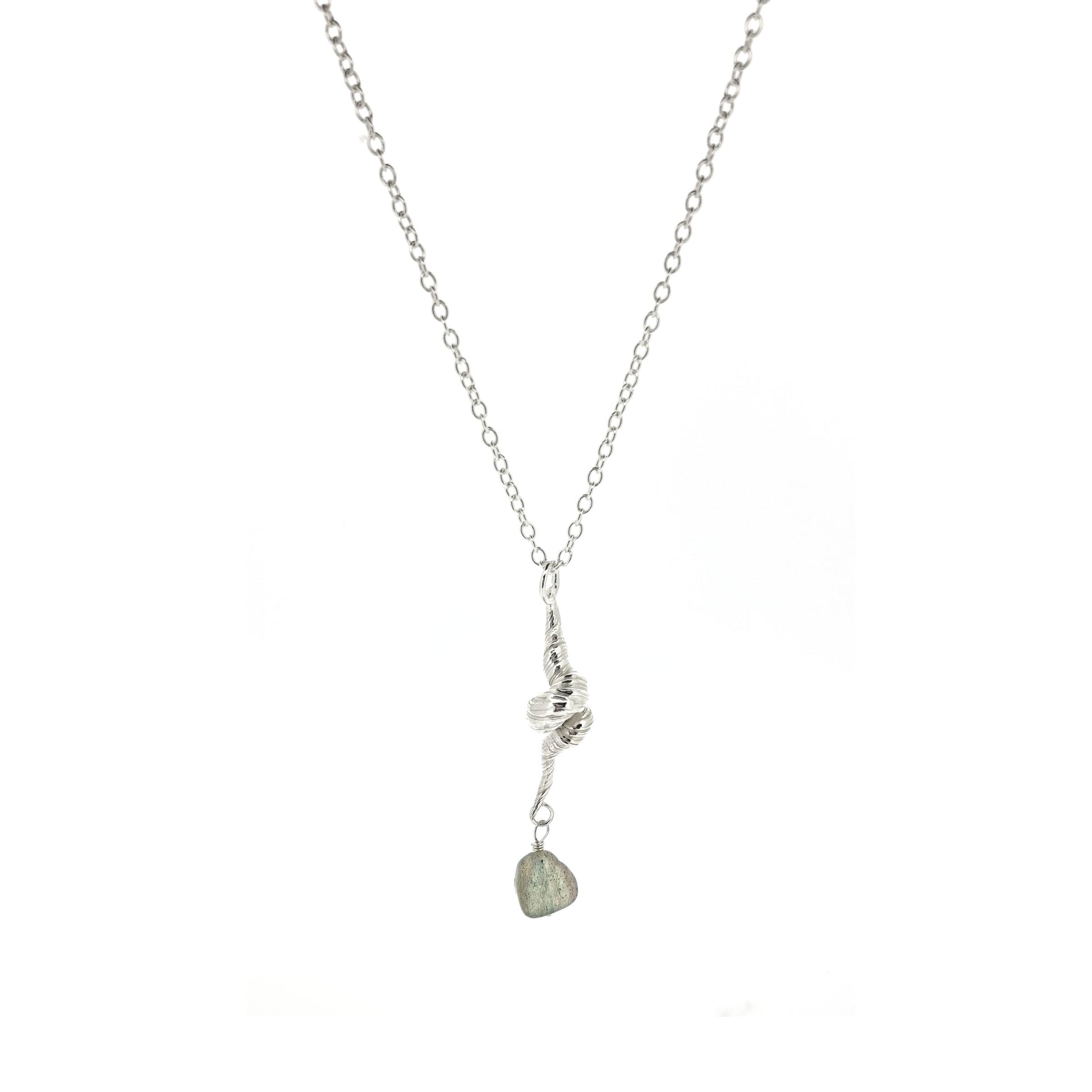 Silver twisted pendant with striations and a labradorite gemstone bead, on a silver chain.