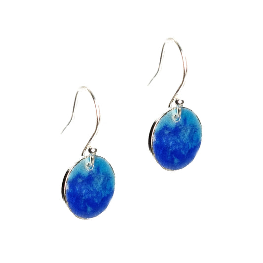 Silver round drop earrings with a mix of dark and light blue enamel.
