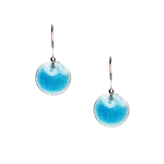 Silver drop earrings with a round disc covered in turquoise blue enamel.