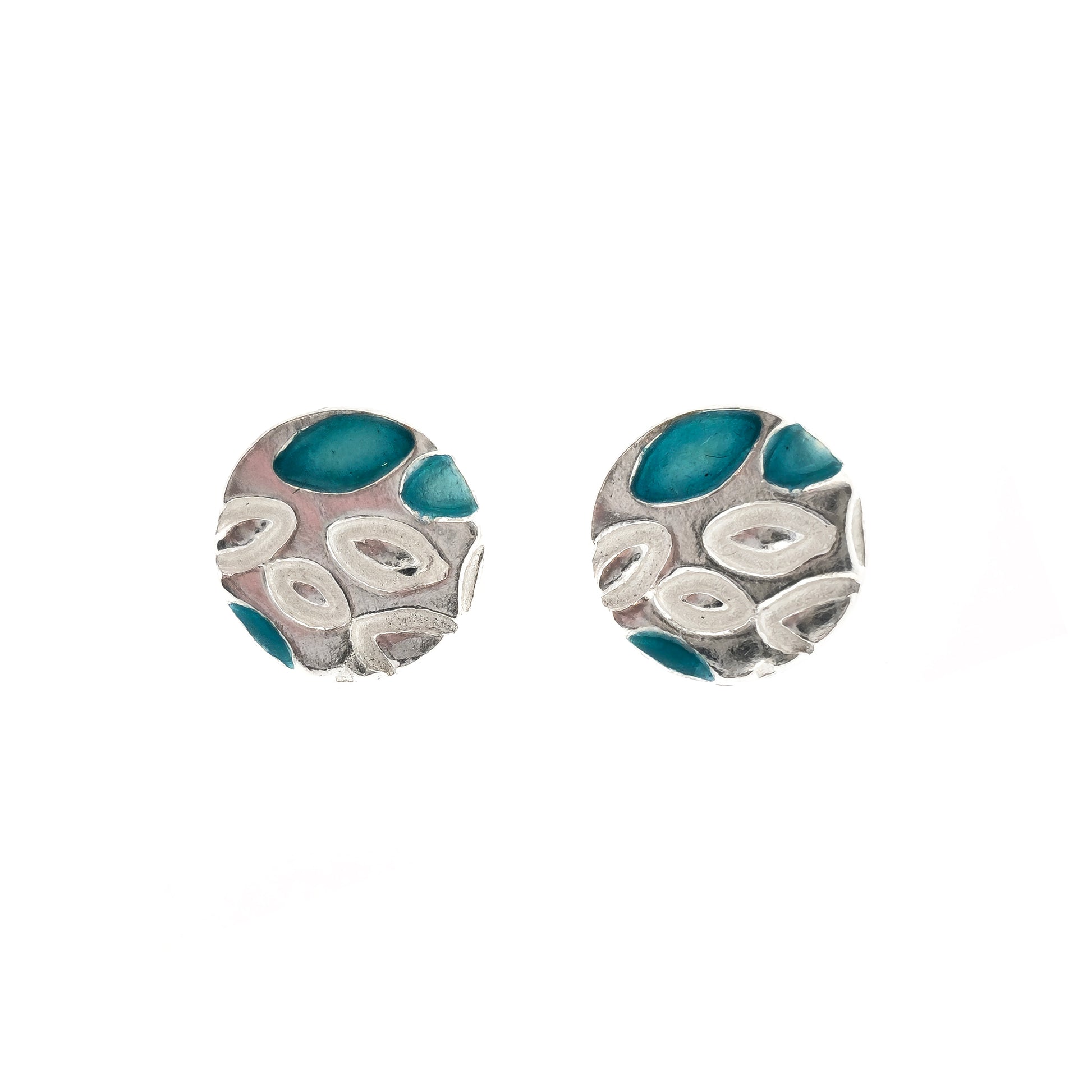 Round silver stud earrings with a leaf shape pattern. Some leaves are filled with turquoise enamel.