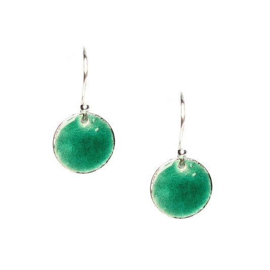 Silver drop earrings with a round disc covered in turquoise green enamel.