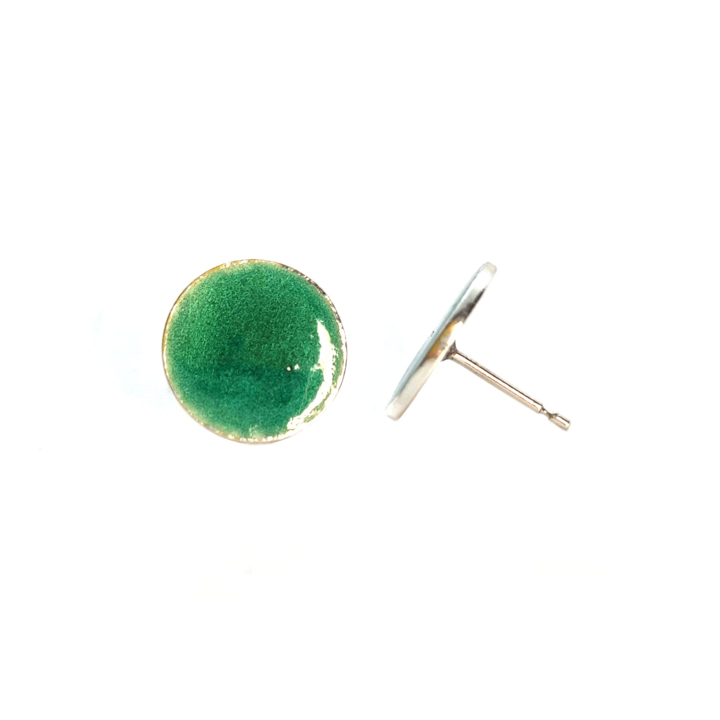 Round silver stud earrings with light green enamel.