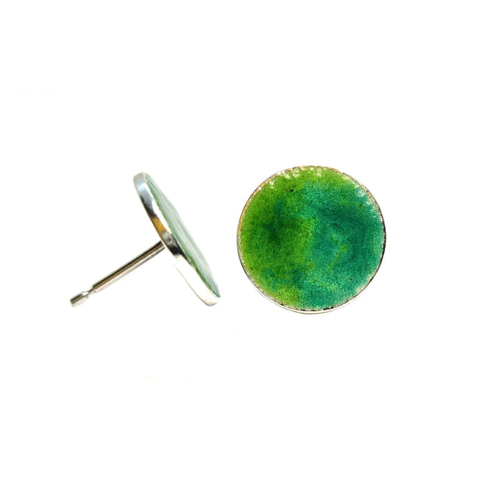 Round silver stud earrings with a mix of green enamels.