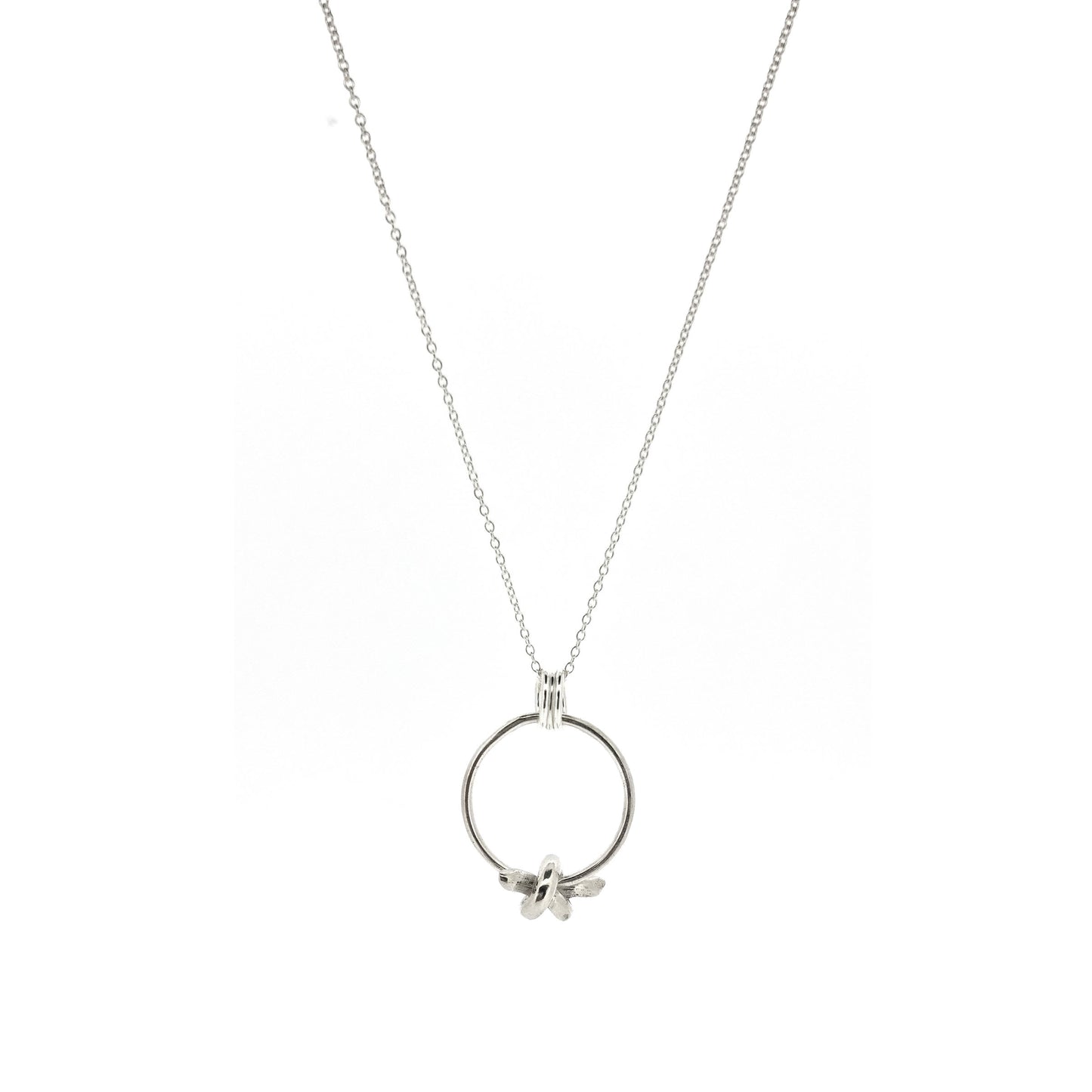 Silver circle pendant with spinning knot charm and triple circle bail. Suspended on a silver chain.