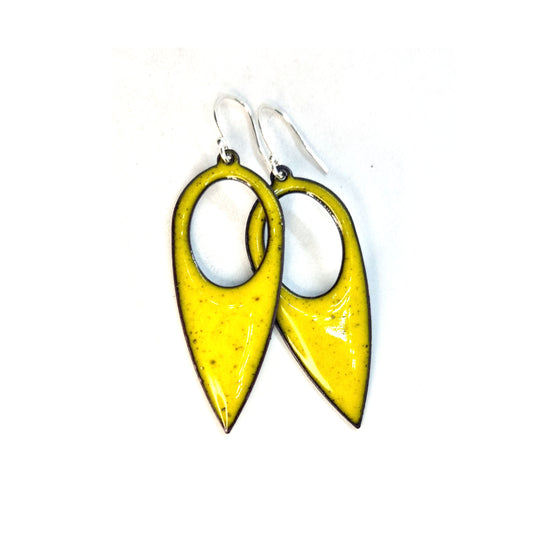 Yellow enamel teardrop shaped drop earrings with a cut out hole. On silver ear wires.