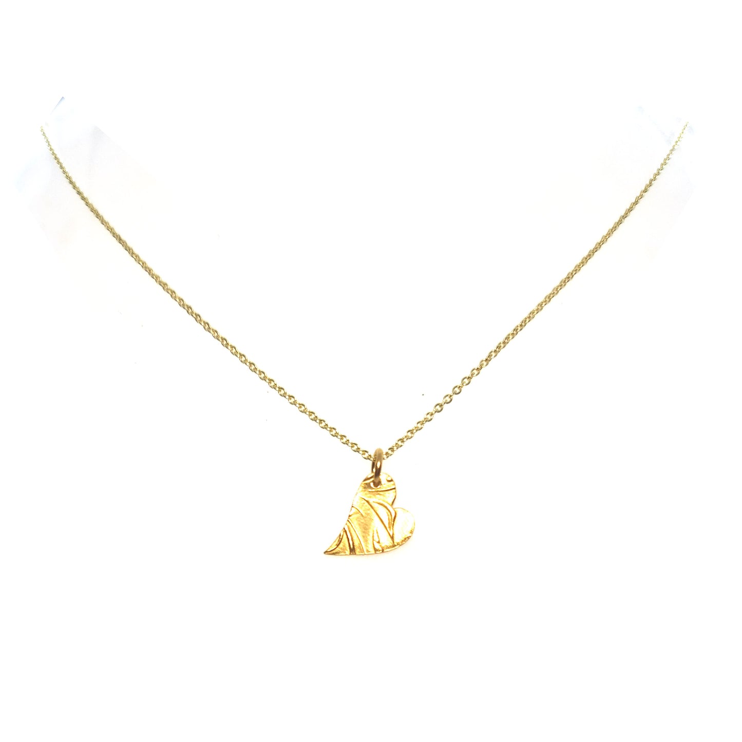 Yellow gold vermeil asymmetrical heart pendant with a leaf & vine design on a yellow gold vermeil chain.