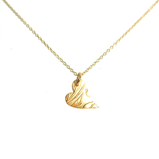 Yellow gold vermeil asymmetrical heart pendant with a leaf & vine design on a yellow gold vermeil chain.