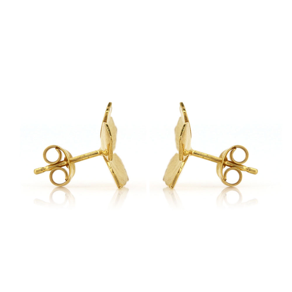 Yellow gold vermeil 5 petal flower stud earrings. Side view.