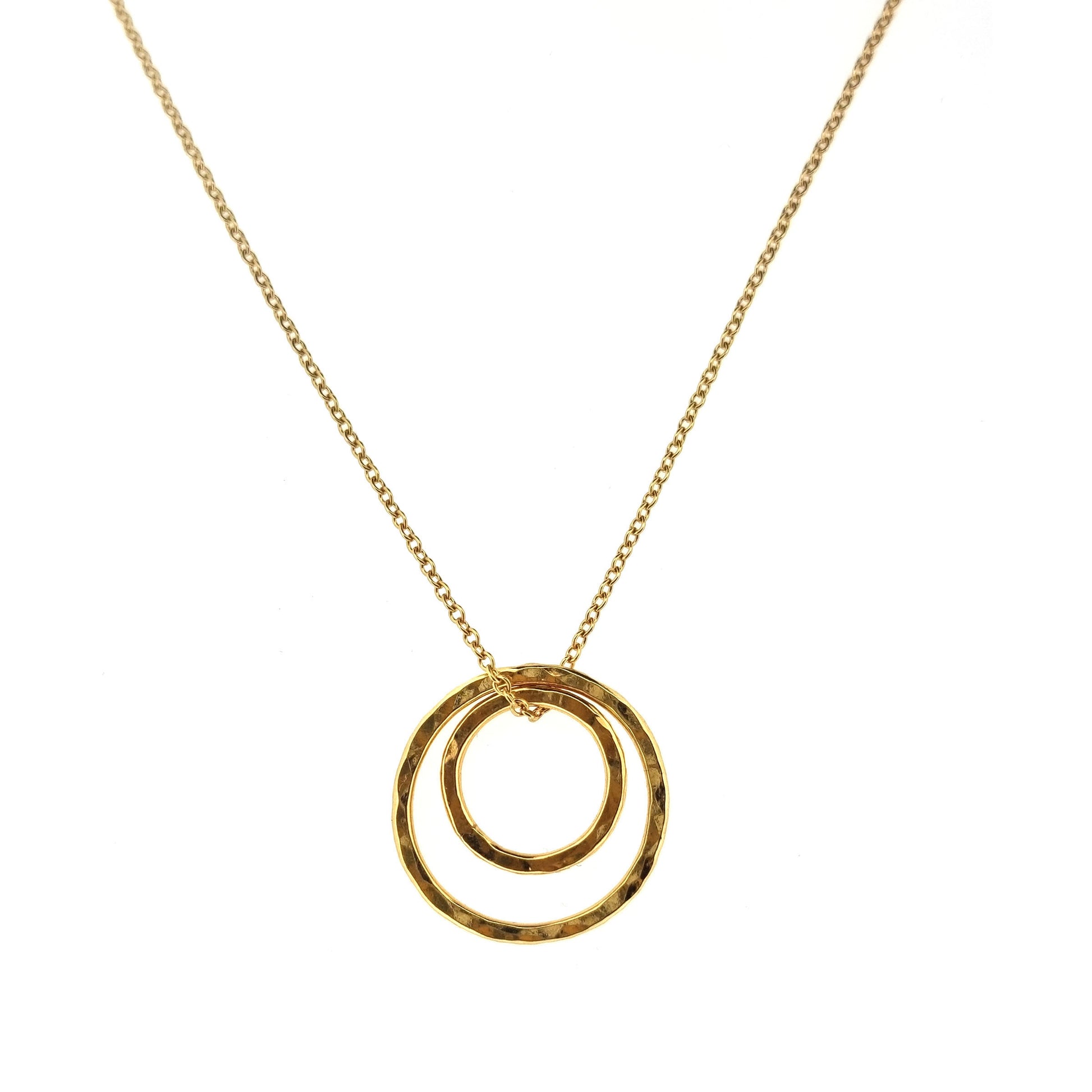 Yellow gold vermeil double open circle pendant on a yellow gold vermeil chain.