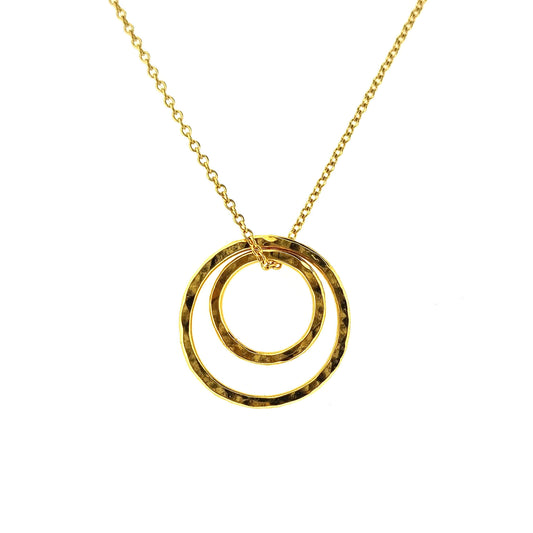 Yellow gold vermeil double open circle pendant on a yellow gold vermeil chain.