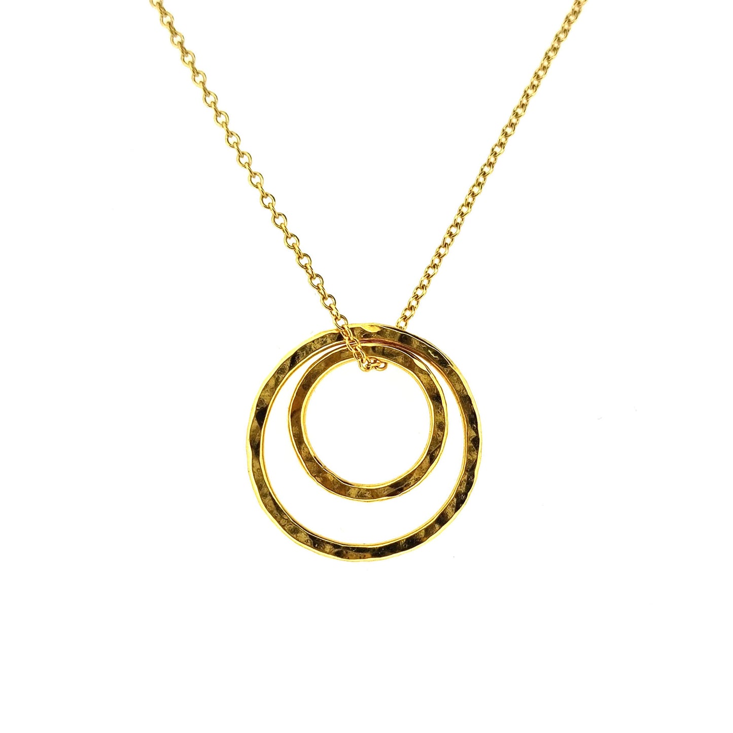 Yellow gold vermeil double open circle pendant on a yellow gold vermeil chain.