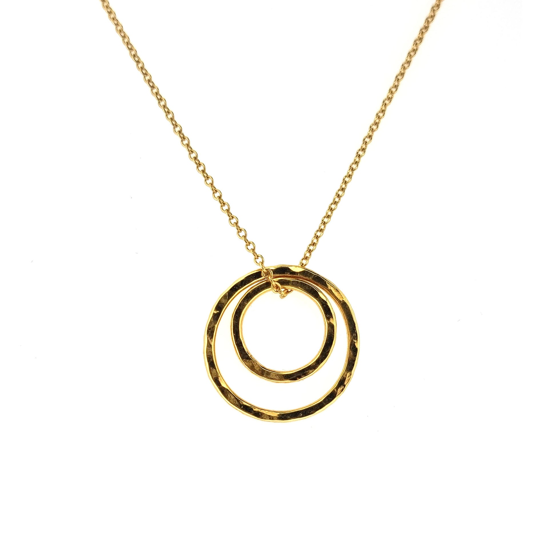 Yellow gold vermeil double open circle pendant on a yellow gold vermeil chain.